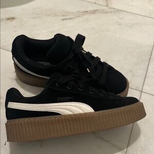 Puma Black Sneakers with White Stripe and Brown Sole
